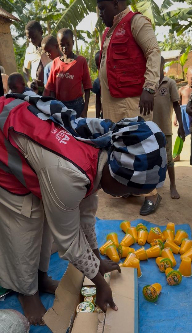 Al Amal Community Relief team distributing aid in Mbale Uganda
